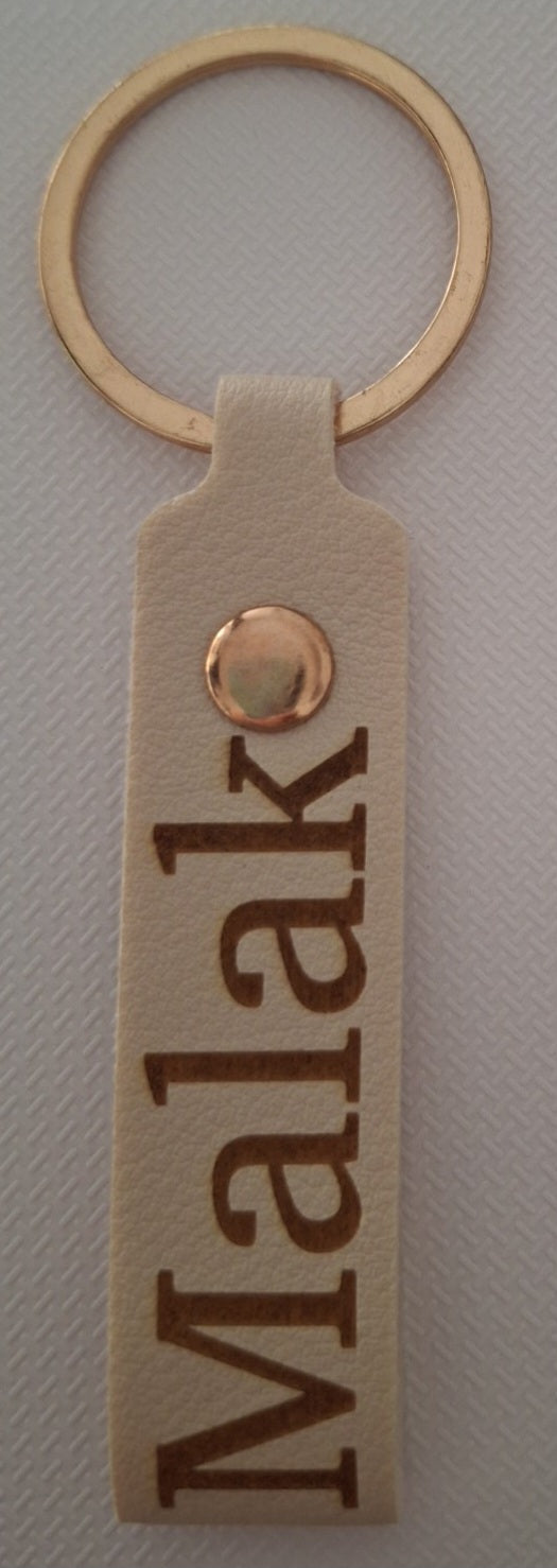 Porte-clé lanière simili cuir ( plusieurs coloris )